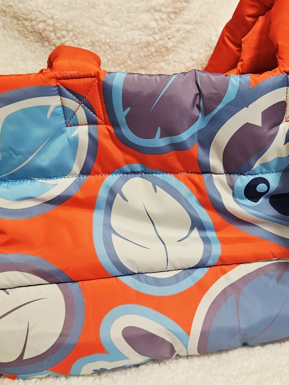 Disney stitch Tote Bright Orange Puffer Tote with Blue and White Leaf Print